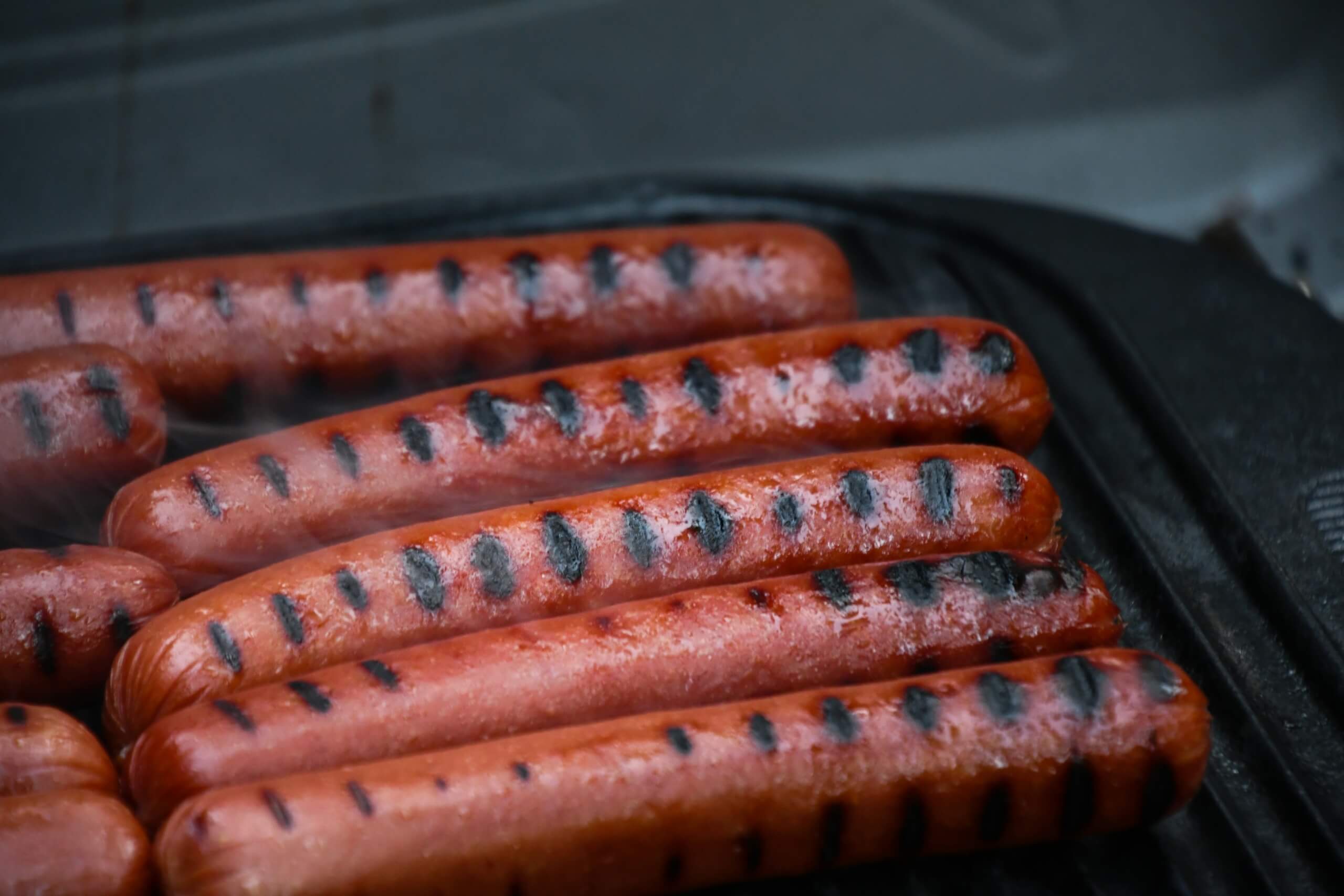 hotdogs on grill - labor day bbq