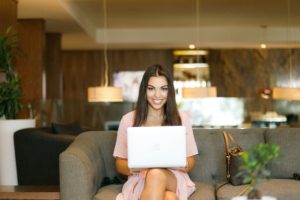 business travel - lady at airport working