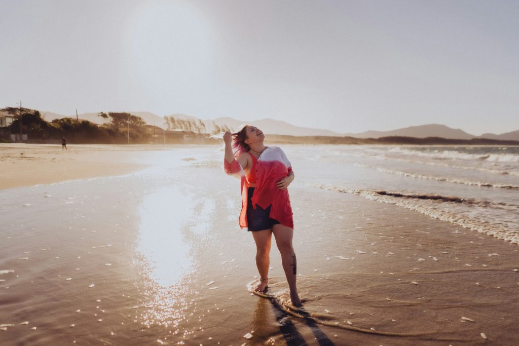 woman on the beach - fall beach trips