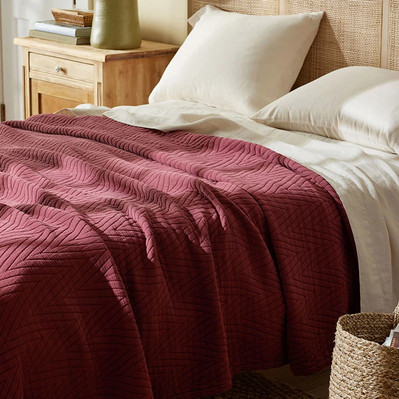 bugundy bedspread fall colors in home decor