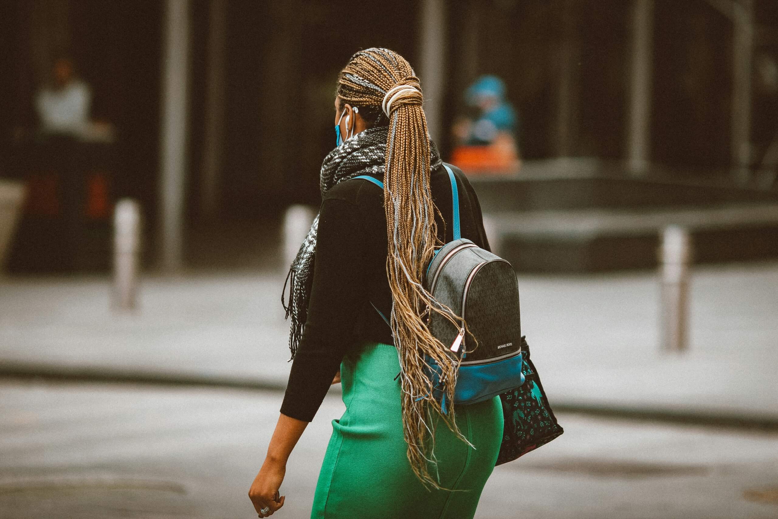 woman walking in the city on travel tuesday