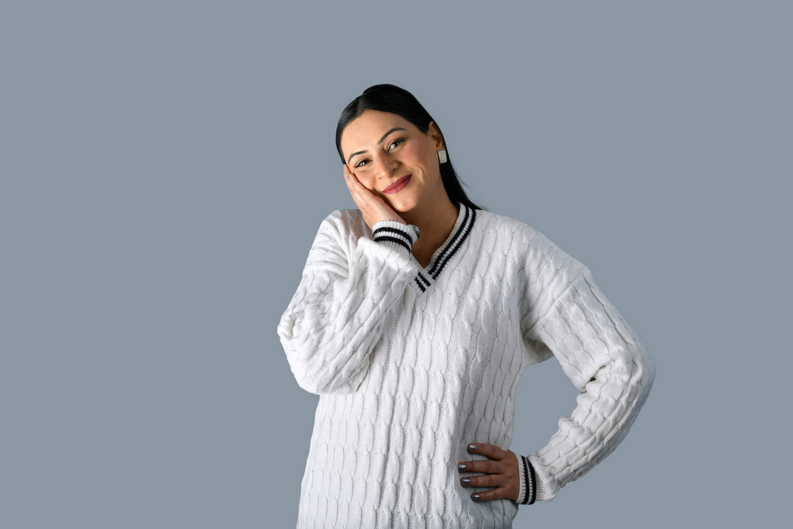 woman happy in sweater fabrics to choose this winter