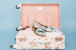 luggage suitcase spring break capsule wardrobe