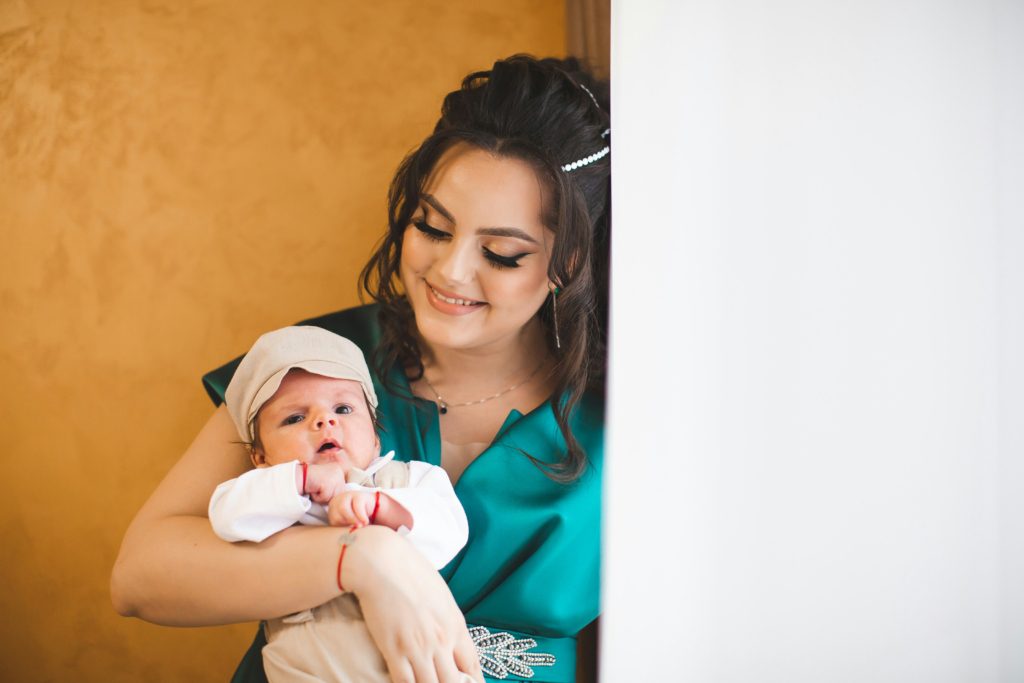 mom with baby Best Postpartum Supplements