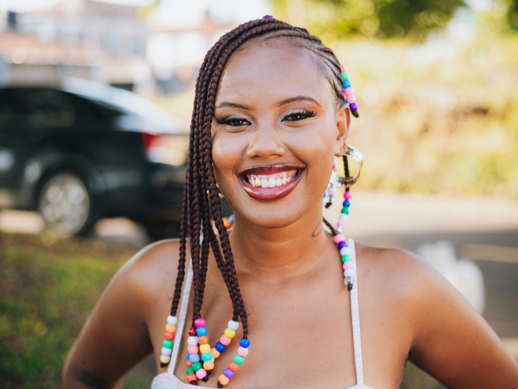 woman with glowing skin in the summer fashion hairstyle skincare routine for summer